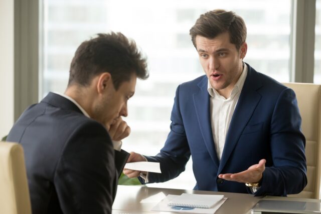 Angry mean boss yelling at employee for missing deadline, executive manager scolding ineffective salesman showing bad work results, firing worker for failure, team leader dissatisfied with report